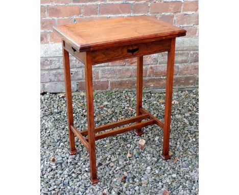 An Edwardian Liberty Style oak fold top card table with pierced heart motif, 53 x 38 x 74cm closed, not labelled but this des