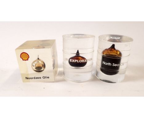 A group of three BP and Shell perspex North Sea Oil promotional paperweights 