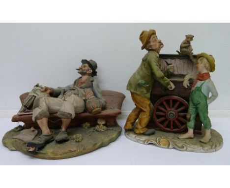 A Capodimonte figure of a tramp seated on a bench and a Capodimonte figure group with musical movement