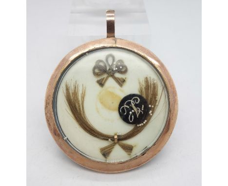A Georgian enamel and gold mourning picture locket with later applied Jasperware plaque