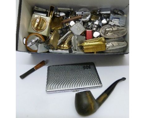 Assorted cigarette lighters, a case and a pipe