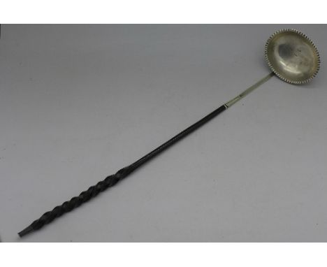 A Georgian toddy ladle, worn provincial silver mark