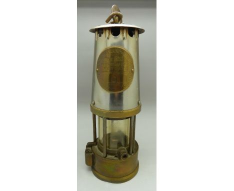 A miner's safety lamp with brass pit check disc Annesley Coll. 248