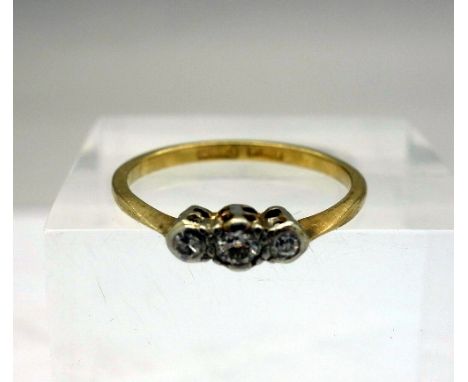 An 18ct gold, platinum and diamond ring, weight 1.8g, size K