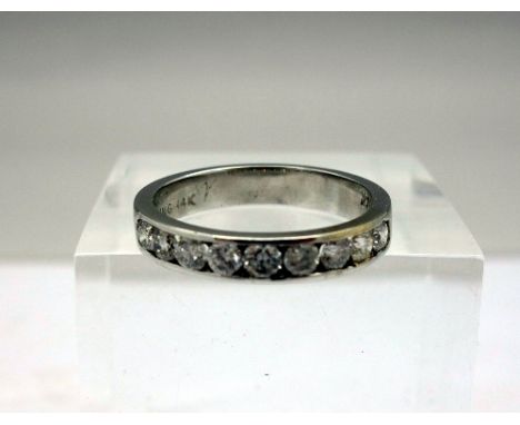 A 14ct white gold, diamond eternity/wedding band, approximately 0.6ct diamond weight, weight 2.9g, size K