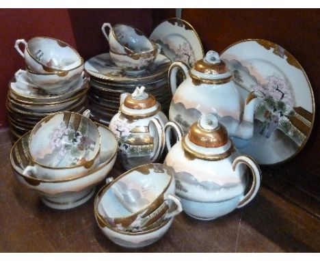 A Japanese decorative tea service, thirty-six pieces in total