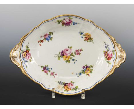 LARGE NANTGARW OVAL FAN HANDLED DISH circa 1817-1820, interior decorated with colourful flower sprays within a continuous blu