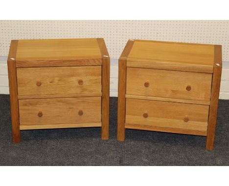 A pair of 2013 Laura Ashley light oak two drawer bedside chests, 50 x 54 x 35cm