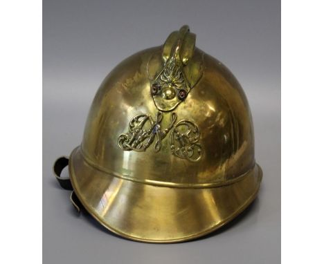 An early/ mid 20th century French brass fireman's helmet