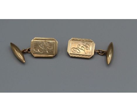 A pair of 9ct gold chain link cufflinks, with a panel bearing the initials PJC. Marked for London 1957. Approximate weight 12