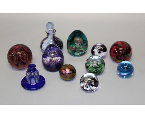 A Caithness limited edition dump form faceted paperweight with bubble inclusions, numbered 26/350, 9.5cm, together with a Cai