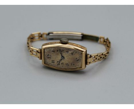 Rolex, an early 20th century lady's 9ct gold cased wristwatch, the rectangular case numbered 69494/1322P. Prima movement ' Ti