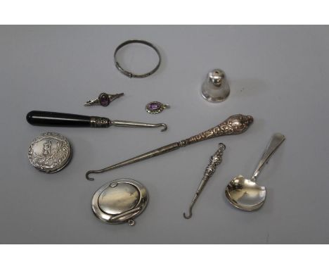 A selection of silver comprising a Victorian amethyst and silver bar brooch, a later amethyst and marcasite pendant, a sterli