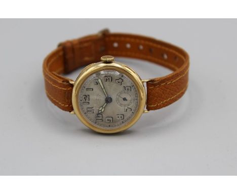 Hicklenton and Phillips, a gentleman's mid-size 18ct gold cased wristwatch. Luminous hands to the 2.5cm engine turned Arabic 