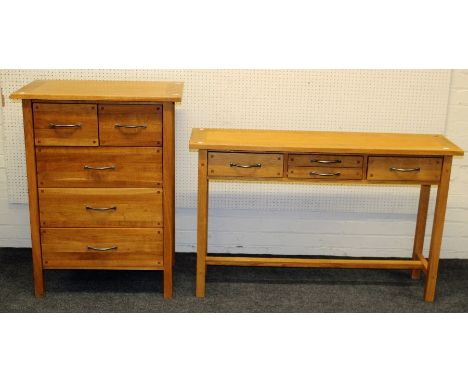 A 2012 Laura Ashley light oak side table, the rectangular top over four drawers on square supports, 80 x 130 x 35cm, together