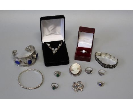 A collection of silver jewellery featuring a double fish brooch deigned by&nbsp;Geoffrey Bellamy, for George Tarrant. Also co