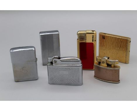 A collection of cigarette lighters to include a vintage Zippo lighter, a Rolstar, a Calibra Molectric, a L-H 1970's style lig