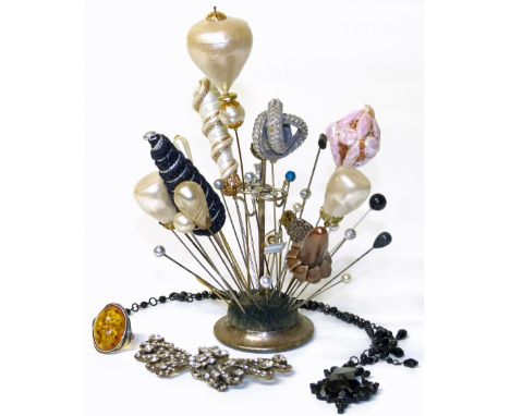Collection of hat pins, jet necklace, paste brooch and amber set ring. Condition reports are not available for this auction