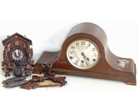 Oak mantel clock and a cuckoo clock. Condition reports are not available for this auction
