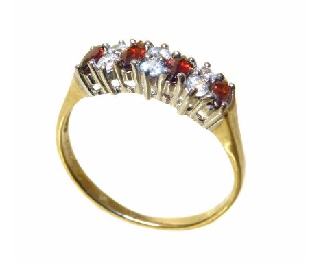 9ct gold garnet and diamond dress ring. Condition reports are not available for this auction