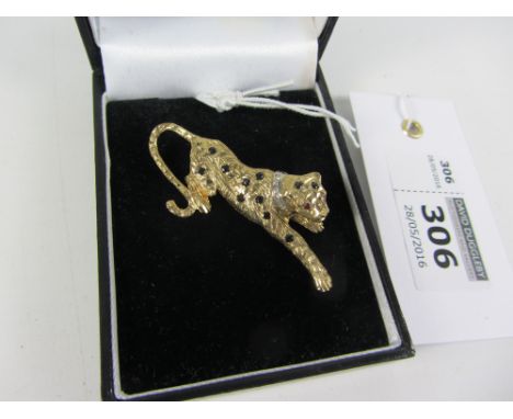 Gold leopard brooch set with diamond collar, sapphire spots and ruby eyes hallmarked 9ct Condition Report Click here for furt