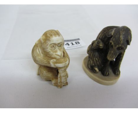 Early 20th century netsuke in form of a dog and puppy and a seated monkey both signed Condition Report Click here for further