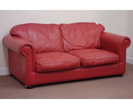 Two seat sofa bed upholstered in red leather (W203cm), and matching footstool Condition Report Click here for further images,