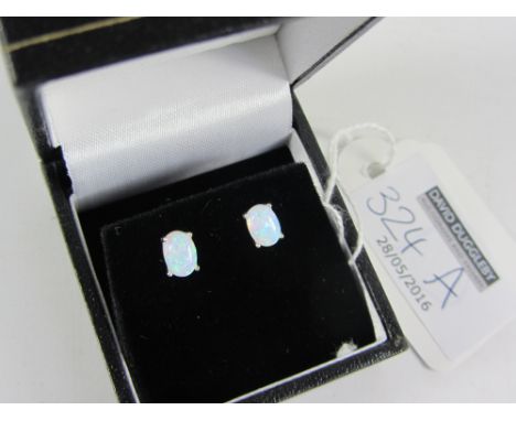 Pair oval opal ear-rings stamped 925 Condition Report Click here for further images, condition, auction times & delivery cost