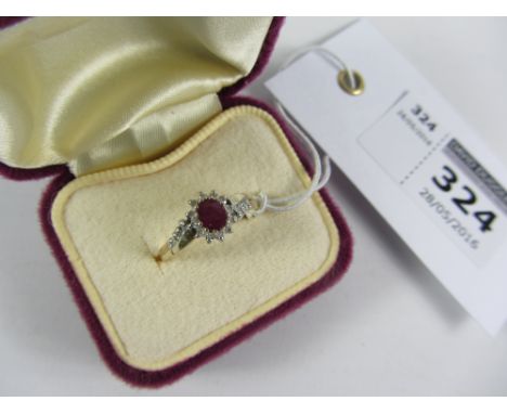 Ruby and diamond cluster ring hallmarked 9ct Condition Report Click here for further images, condition, auction times & deliv