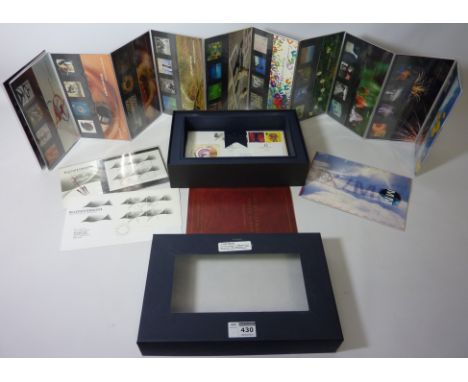 A boxed collection of Millennium First Day Covers and presentation packs includes mini sheets and special pack Condition Repo