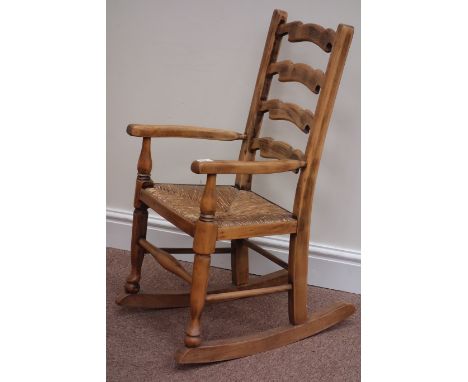 Farmhouse style beech ladder back child's rocking chair with rush seat Condition Report Click here for further images, condit