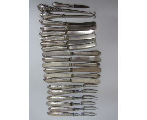 Six hors d'oeuvres forks, twelve knives, two button hooks and a nail file all with hallmarked silver handles Condition Report