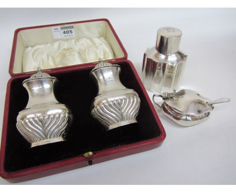 Pair of Edwardian silver peppers boxed, Victorian silver tea caddy and a mustard with spoon and liner all hallmarked Conditio