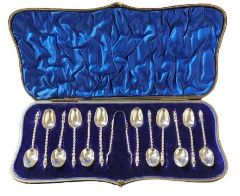 A cased set of apostle type teaspoons and pair of tongs, the twelve spoons and tongs with twisted handles, William Hutton & S