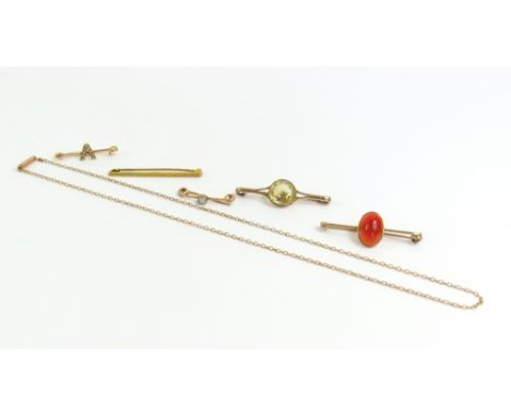 A small 9ct gold bar brooch set with a single opal, a patterned bar brooch marked 'HG & S 9ct', a bar brooch set with an oval