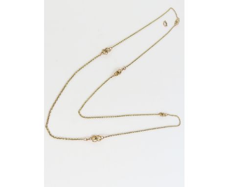 A necklace with Celtic knot type motif set between trace links, with a bolt ring clasp so that it can be worn doubled, tests 