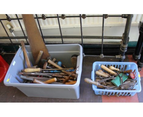 A broad assortment of old hand tools, to include drills, chisels, mallets, etc