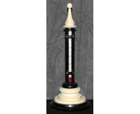 An ivory and cast phenolic thermometer, as found, 26cm high The Art Deco Carvings of W. G. Collins (1872-1959) Worshipful Com