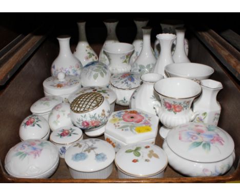 A broad selection of ceramic lady's vanity table items, to include ring boxes, powder puffs, vases, etc 