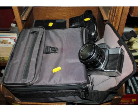 A selection of five vintage camera, to include a Praktica MTL3, all in original carry cases