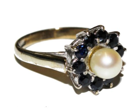 A 9 carat sapphire and cultured pearl ring