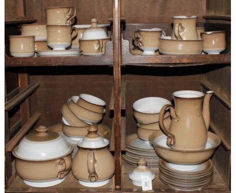 A fifty-eight piece Denby service, to include cups, saucers, plates, serving plates, bowls, tureens, etc