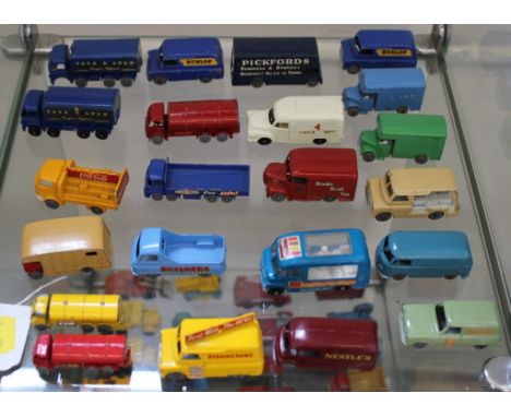Twenty-two Matchbox 1-75 Series Light Commercials, including NestleS, Ever Ready, Coco-Cola and Evening News, (22)
