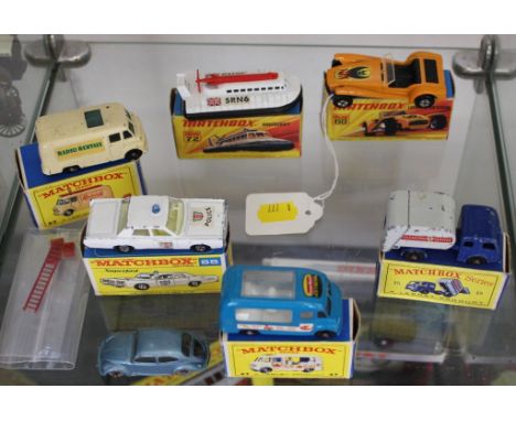 Seven Matchbox 1-75 series, including Commer 'Radio Rentals' Van with ladder and three TV sets, Lyons Maid Ice Cream and Tipp