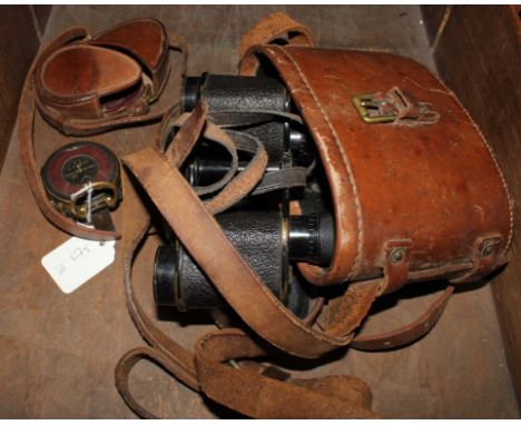 A pair of vintage binoculars by A. Kershaw and Son's, Leeds, 1918 with leather carry case and an E. Coehn number 11375, Verne