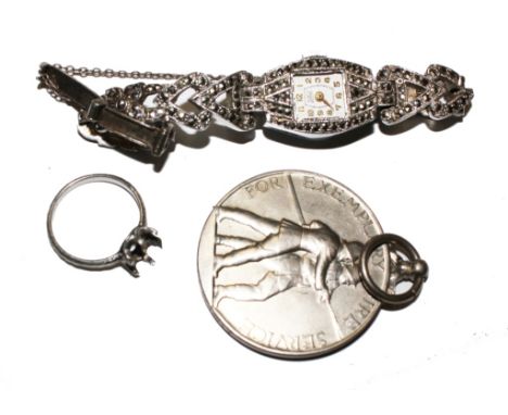 A platinum ring shank, a fireman's medal and a lady's watch 