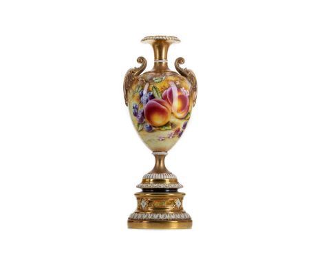 ROYAL WORCESTER TWIN-HANDLED VASE,the baluster body hand painted with fruits by Sally Wood and signed, on waisted stem to ped