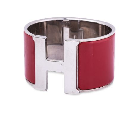 AN HERMÈS ENAMEL CLIC CLAC EXTRA WIDE BRACELET Polished silver plated band with a hinge on side, swivel 'H' closure, rouge en