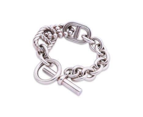 AN HERMÈS SILVER 'CHAÎNE D'ANCRE PARADE' BRACELET
Marked '925', 'T' clasp closure, includes dust bag

 Evident signs of wear,