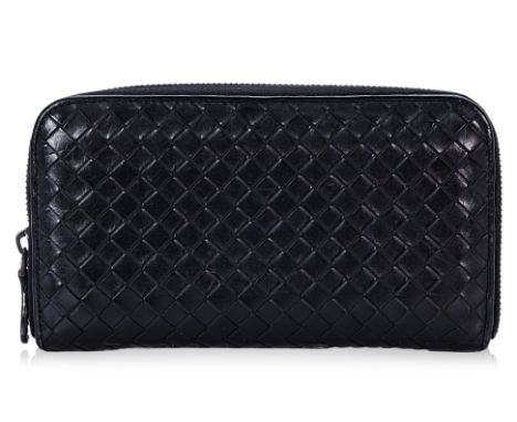 A BOTTEGA VENETA INTRECCIATO BLACK LEATHER WALLET
Leather interior with zipper compartment, card slots, and patch pockets, in